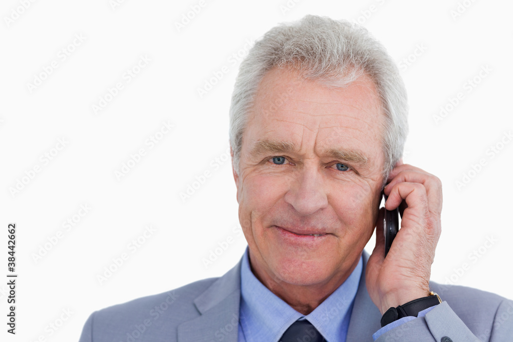 Close up of mature tradesman on his cellphone Close up of mature tradesman on his cellphone