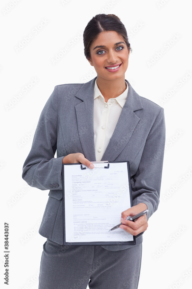 Smiling female entrepreneur asking for signature Smiling female entrepreneur asking for signature