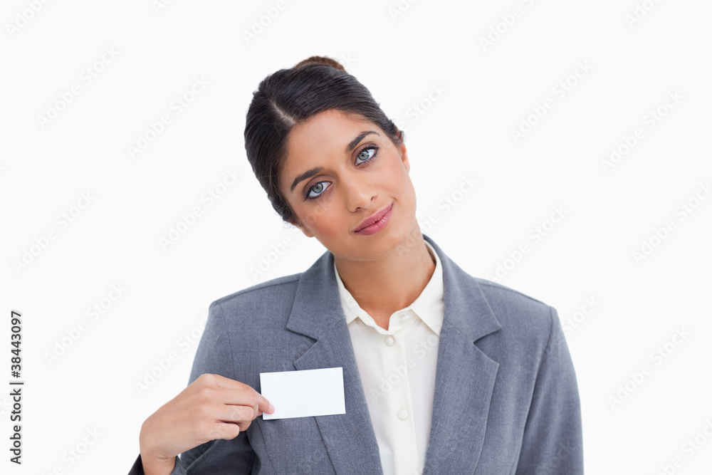Female entrepreneur pointing at name sign Female entrepreneur pointing at name sign