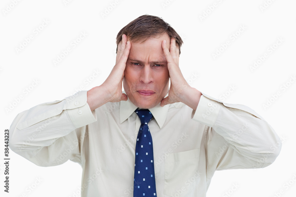 Close up of businessman experiencing a headache Close up of businessman experiencing a headache