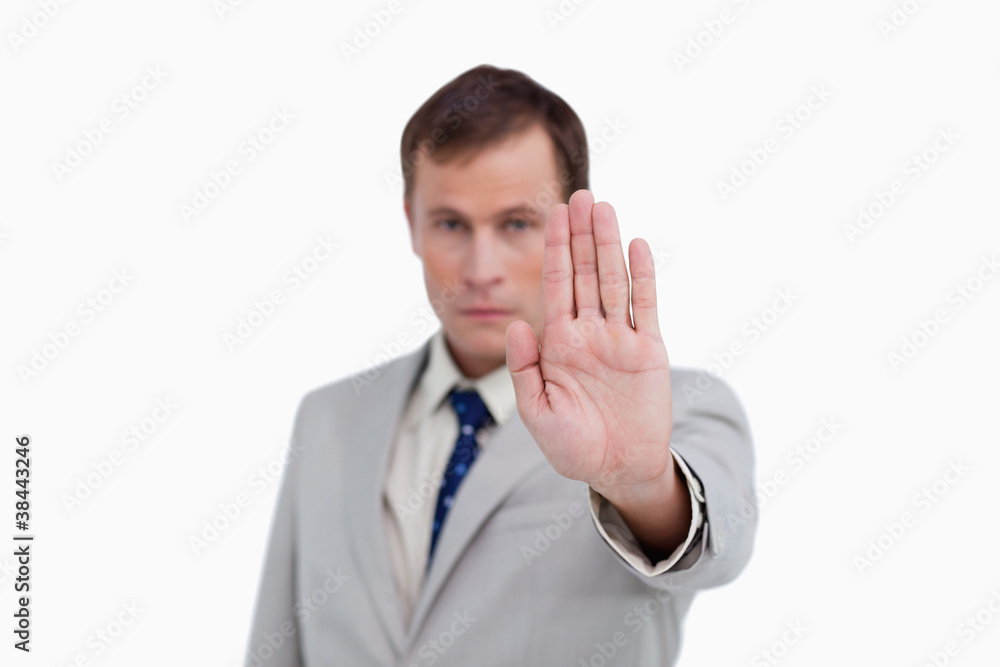 Close up of businessman's palm signalizing stop Close up of businessman's palm signalizing stop