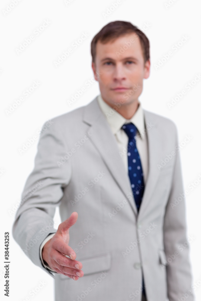 Hand of businessman being offered Hand of businessman being offered