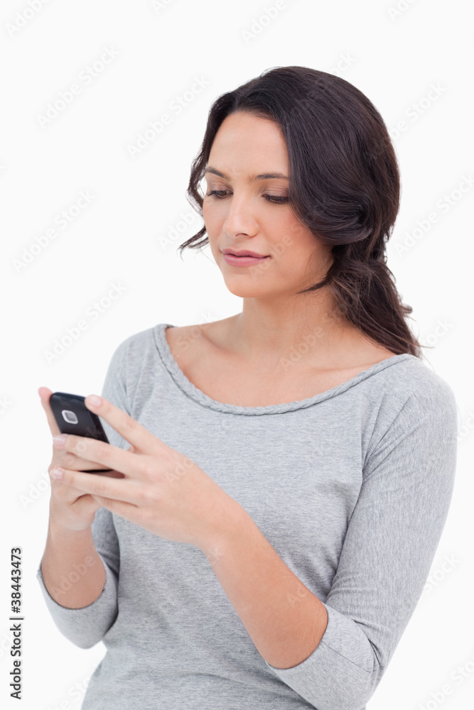 Close up of woman reading text message Close up of woman reading text message