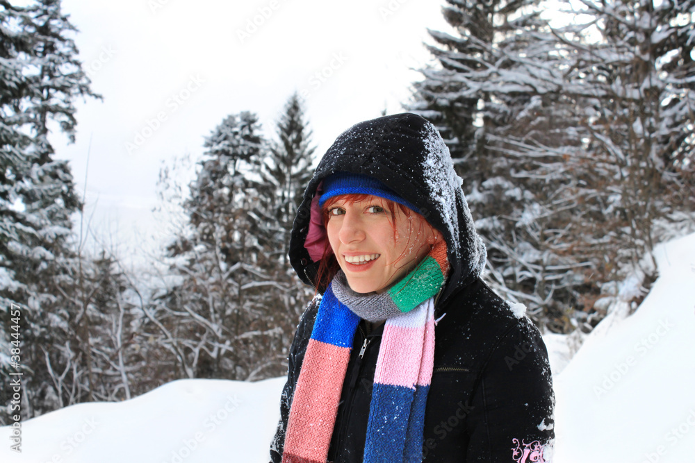 Happy woman on her winter vacation in mountains Happy woman on her winter vacation in mountains
