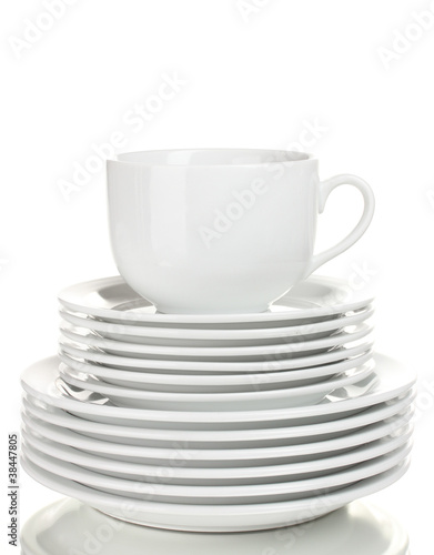 Clean plates and cup isolated on white