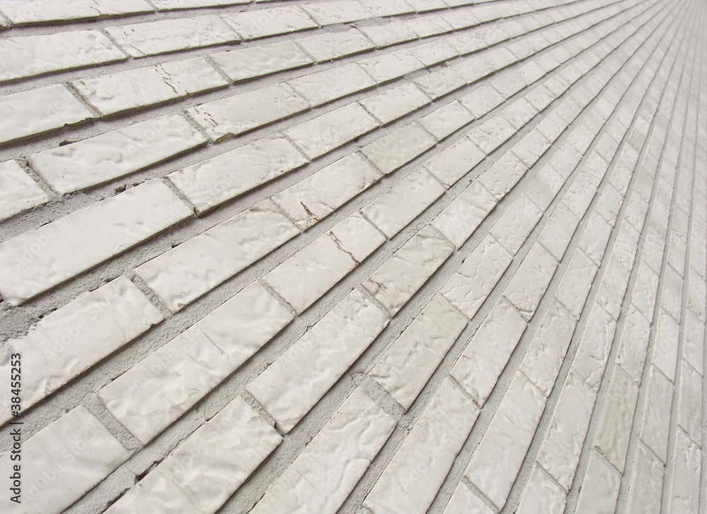 detail of a large wall with white glazed tiles detail of a large wall with white glazed tiles