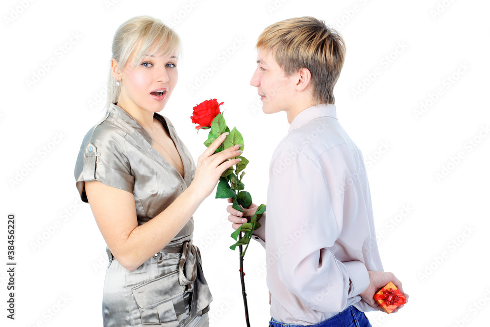 couple with gift and flower isolated on white couple with gift and flower isolated on white