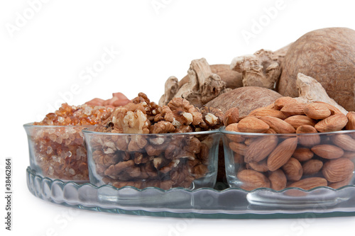 Mixed dry fruits in glas bowl photo