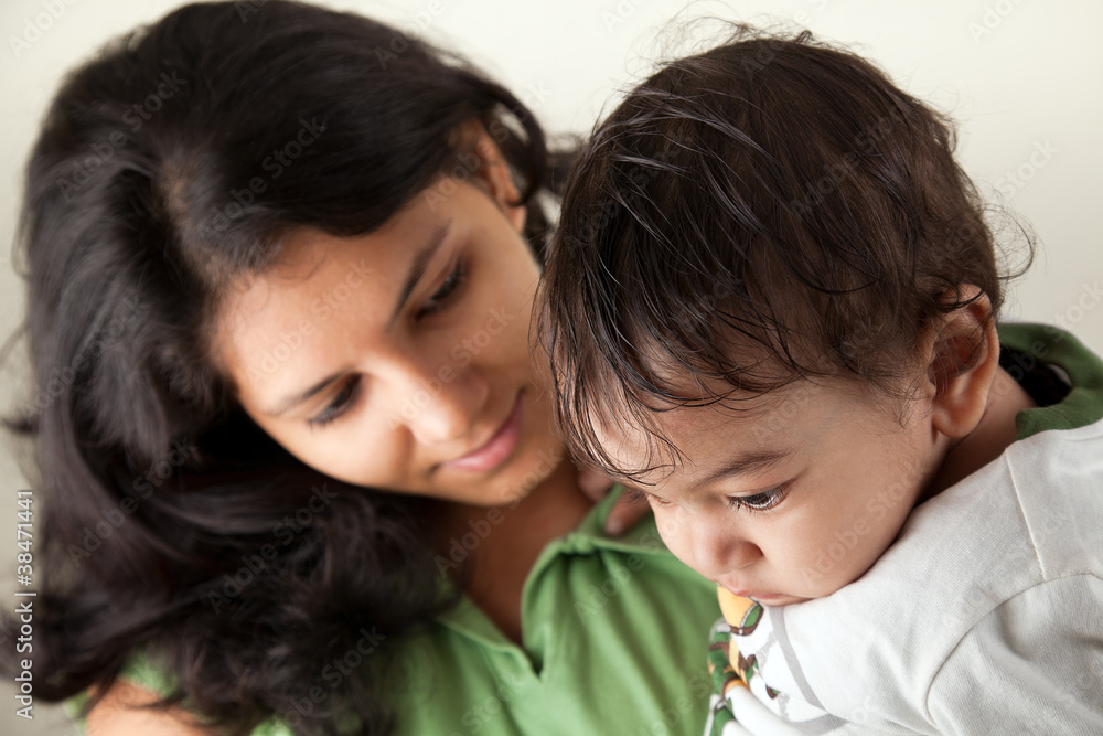 Indian mother and baby smiling Indian mother and baby smiling