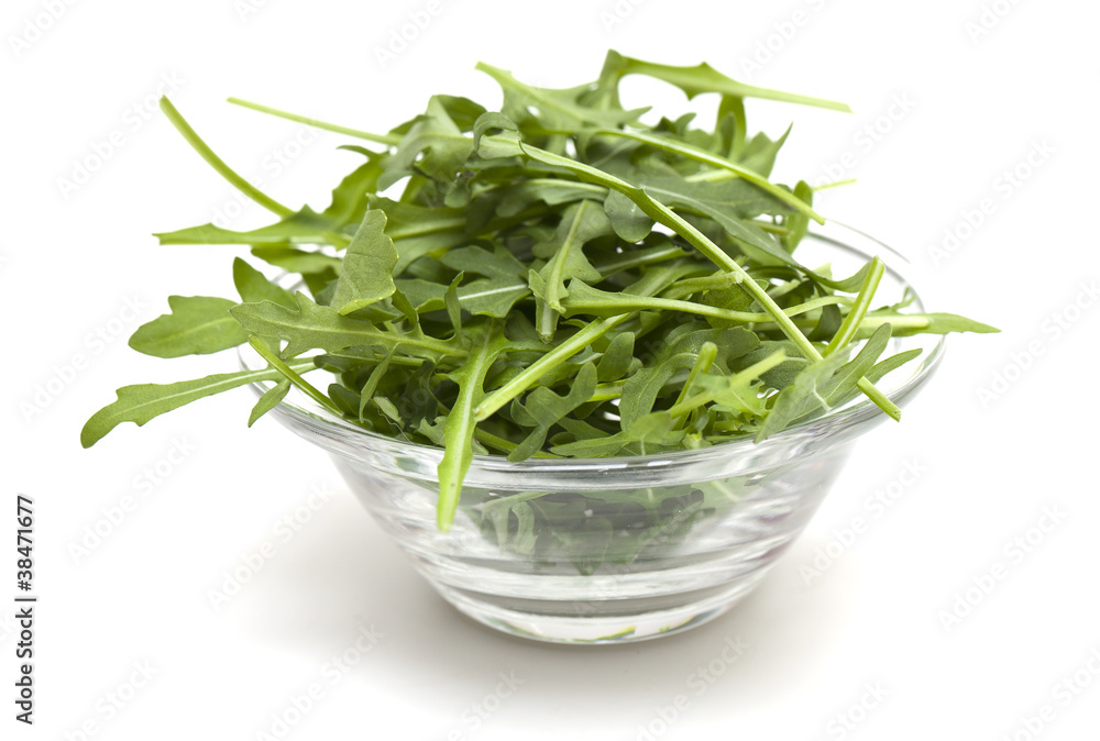 fresh rucola leafs in a glass bowl fresh rucola leafs in a glass bowl