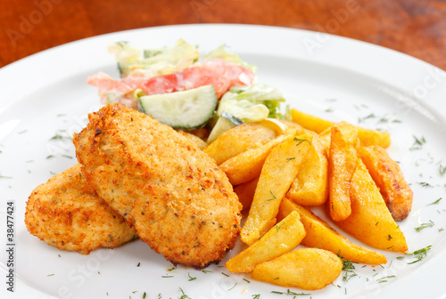 chicken cutlet with fried potatoes