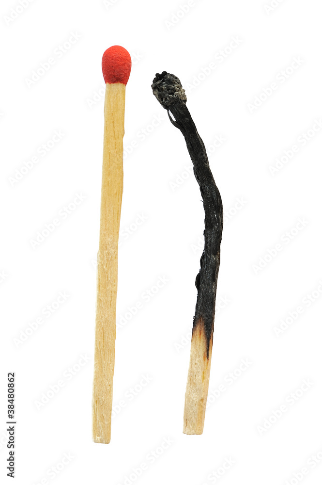 Close-up of a burnt match and a whole red match Close-up of a burnt match and a whole red match