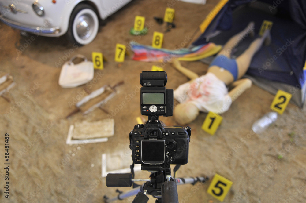 Take a photo of a crime scene with victim body on the ground Take a photo of a crime scene with victim body on the ground