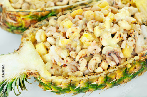 Shrimps served in ananas with cashew