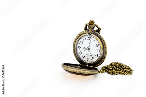 Old pocket watch isolated on white background.