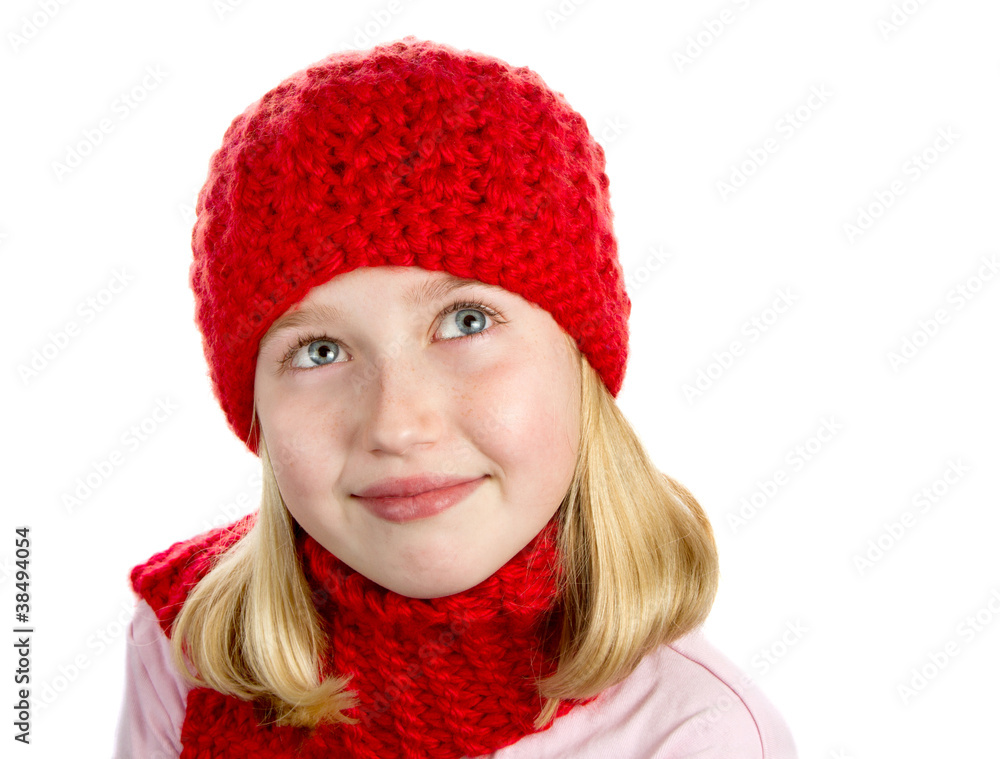 a cute girl in a red winter hat a cute girl in a red winter hat