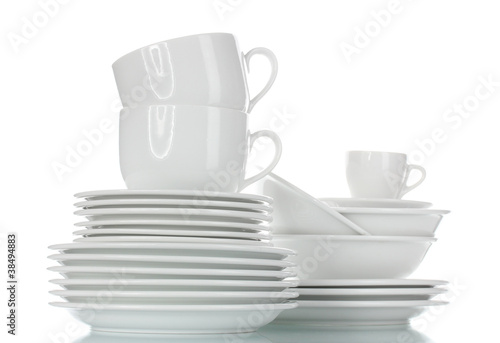 empty bowls, plates and cups isolated on white