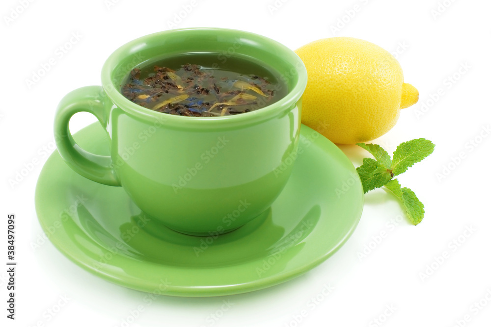 Cup with green tea, with mint and lemon.