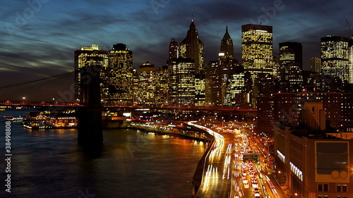 New York City Manhattan with Brooklyn Bridge at dusk time lapse
