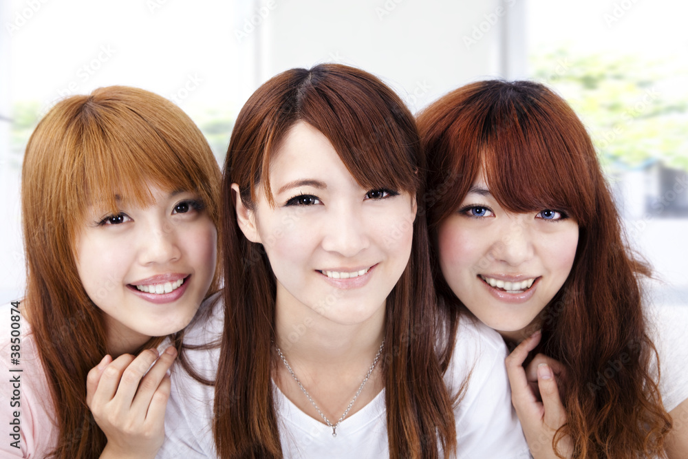 smiling asian young woman smiling asian young woman