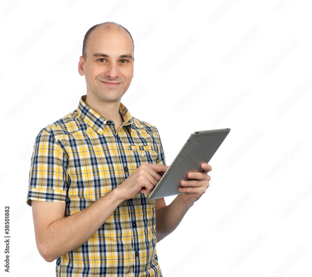 Handsome man using a tablet computer Handsome man using a tablet computer