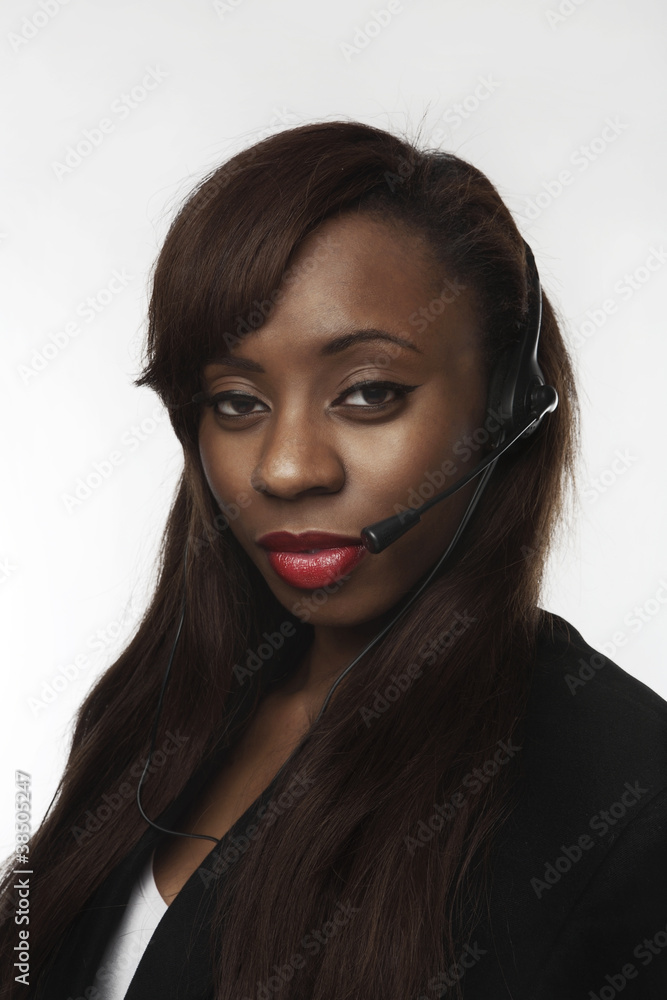 woman using a headset to talk to someone on the phone woman using a headset to talk to someone on the phone