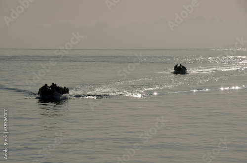 Inflatable boats carrying scuba divers