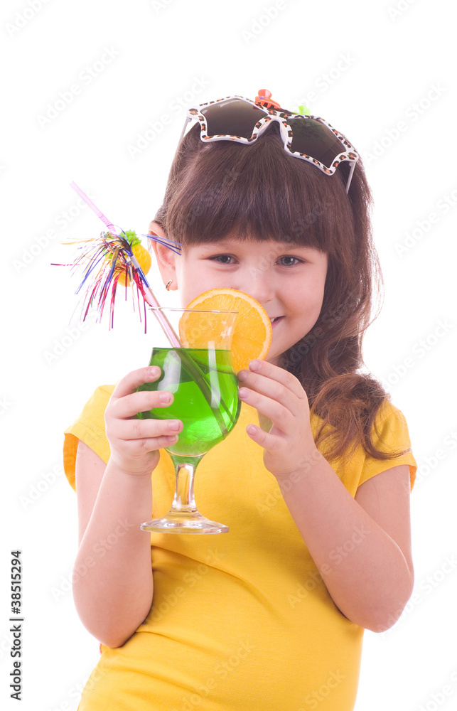 Beautiful little girl drinking green child's cocktail Beautiful little girl drinking green child's cocktail