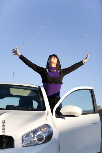 Woman enjoing her new car