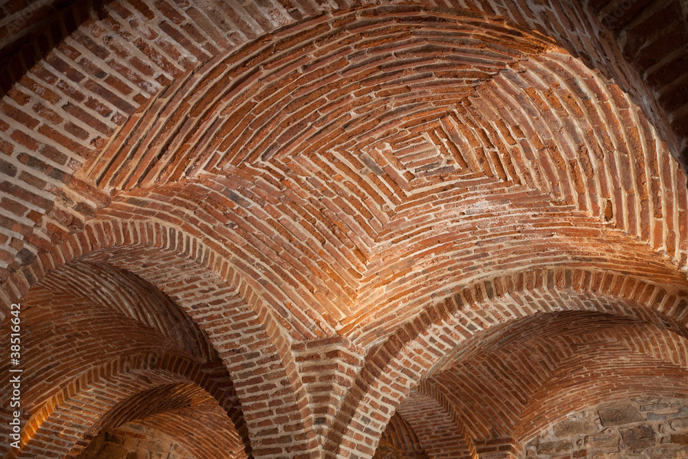 Fototapeta premium Arabic brick vault in Bujaco tower, Caceres, Spain