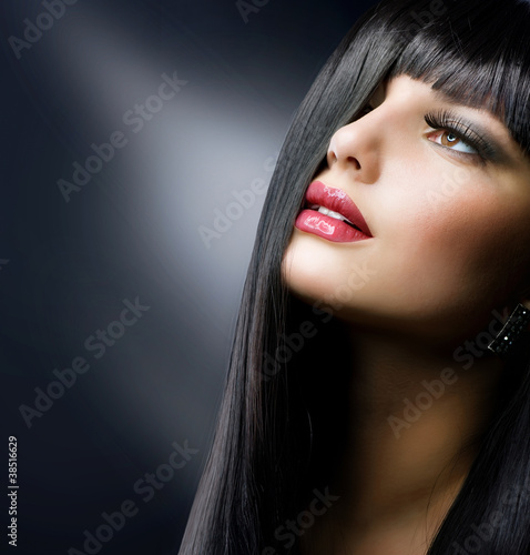 Fashion Brunette. Beautiful Makeup and Healthy Black Hair #38516629