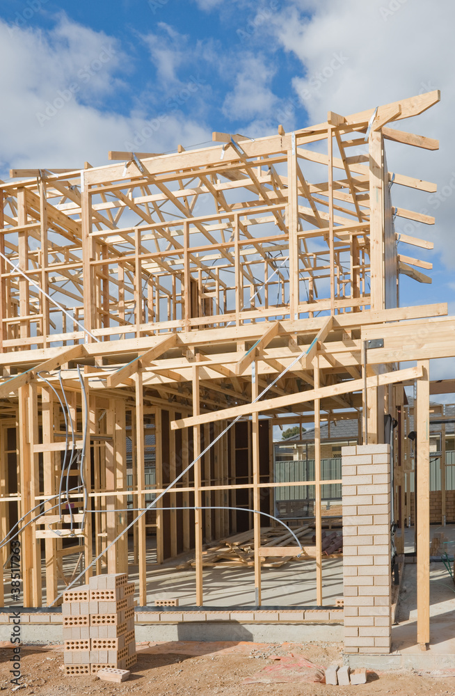 Obraz premium New home construction framing.