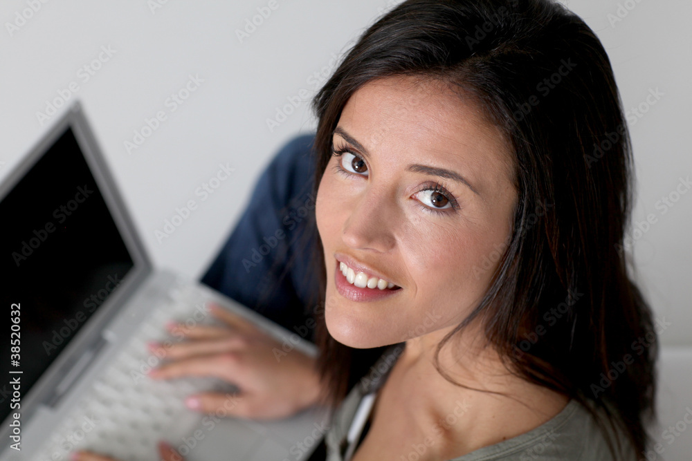 Upper view of woman using laptop computer Upper view of woman using laptop computer