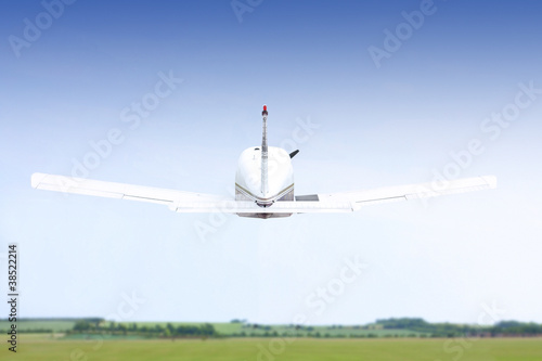 small plane taking off