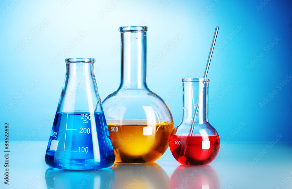 Three flasks with color liquid with reflection Three flasks with color liquid with reflection