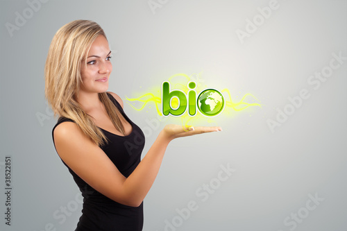 woman holding virtual eco sign © ra2 studio