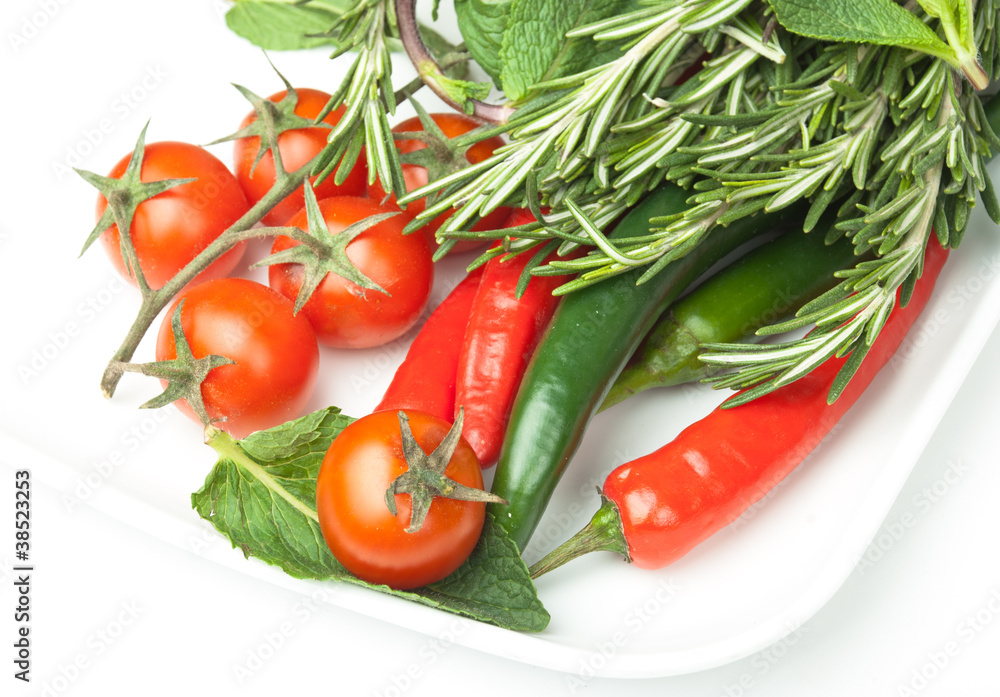 fresh vegetables in plate isolated on white background fresh vegetables in plate isolated on white background