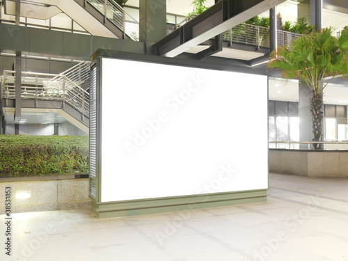 Blank billboard in modern building