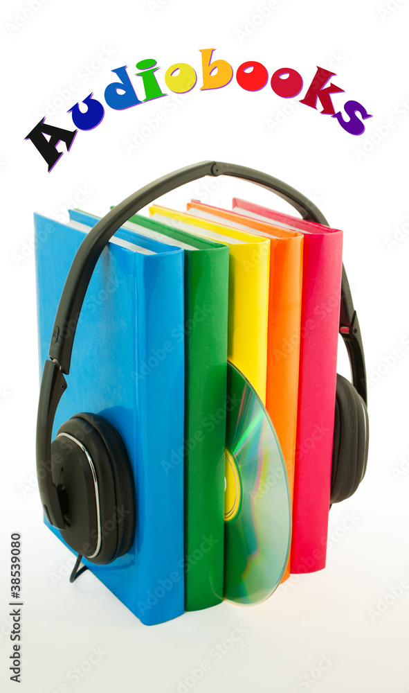 Row of books and headphones - Audiobooks concept