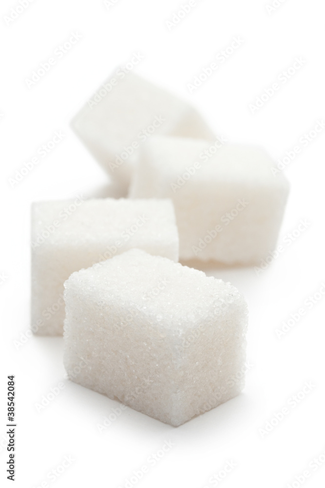 Cubes of sugar on the white background Cubes of sugar on the white background