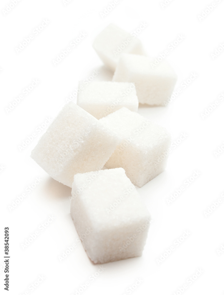 Cubes of sugar on the white background Cubes of sugar on the white background