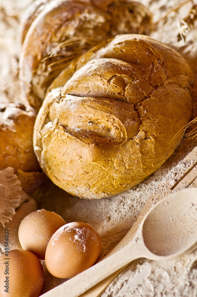 Bread with different kitchen equipment