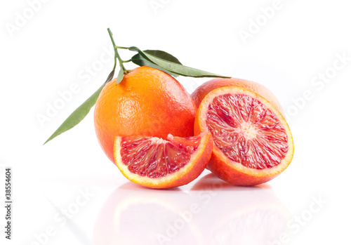 Blood red oranges isolated on white background