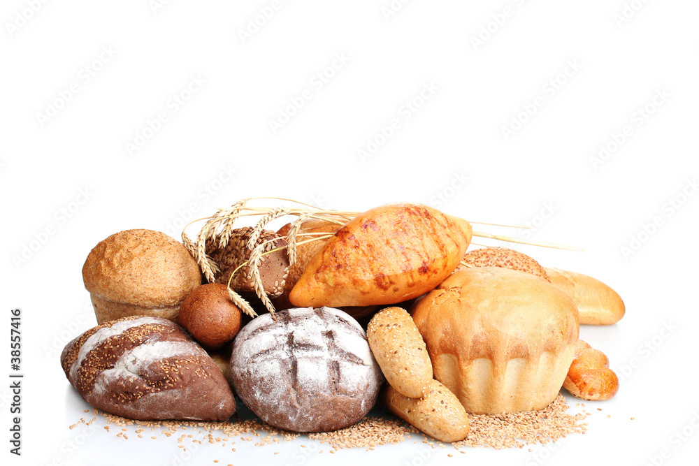 delicious breads and wheat isolated on white