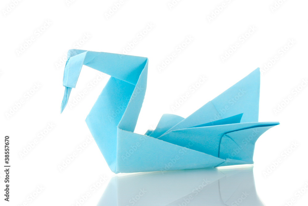 Origami swan out of the blue paper isolated on white Origami swan out of the blue paper isolated on white