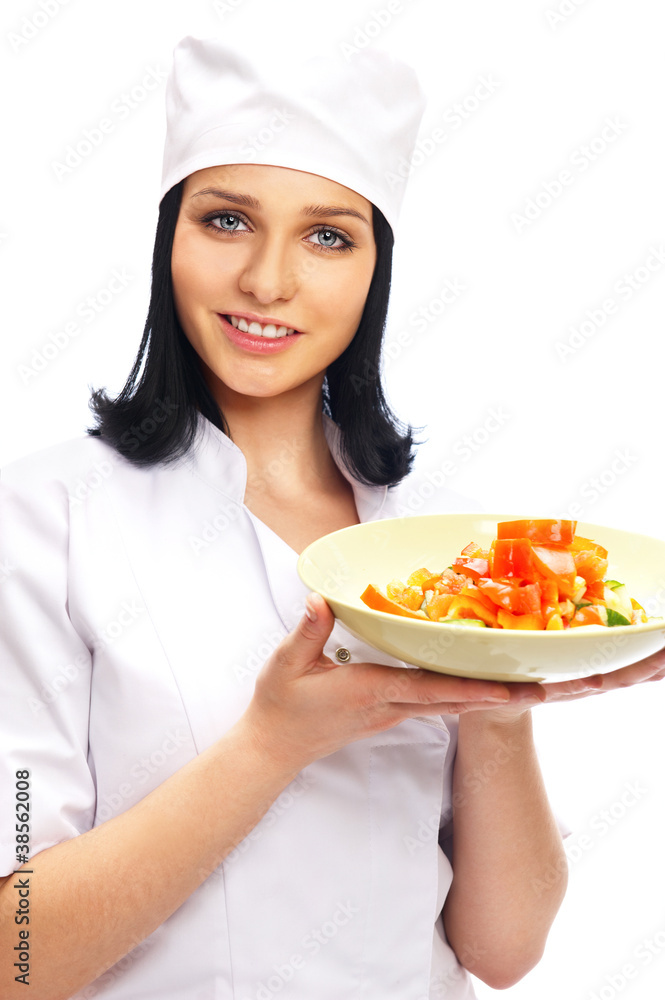 Professional Cook with plate of salad, isolated on white backgro Professional Cook with plate of salad, isolated on white backgro