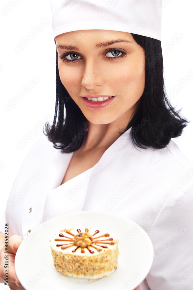 Professional Cook with cute cake on white plate, isolated on whi Professional Cook with cute cake on white plate, isolated on whi