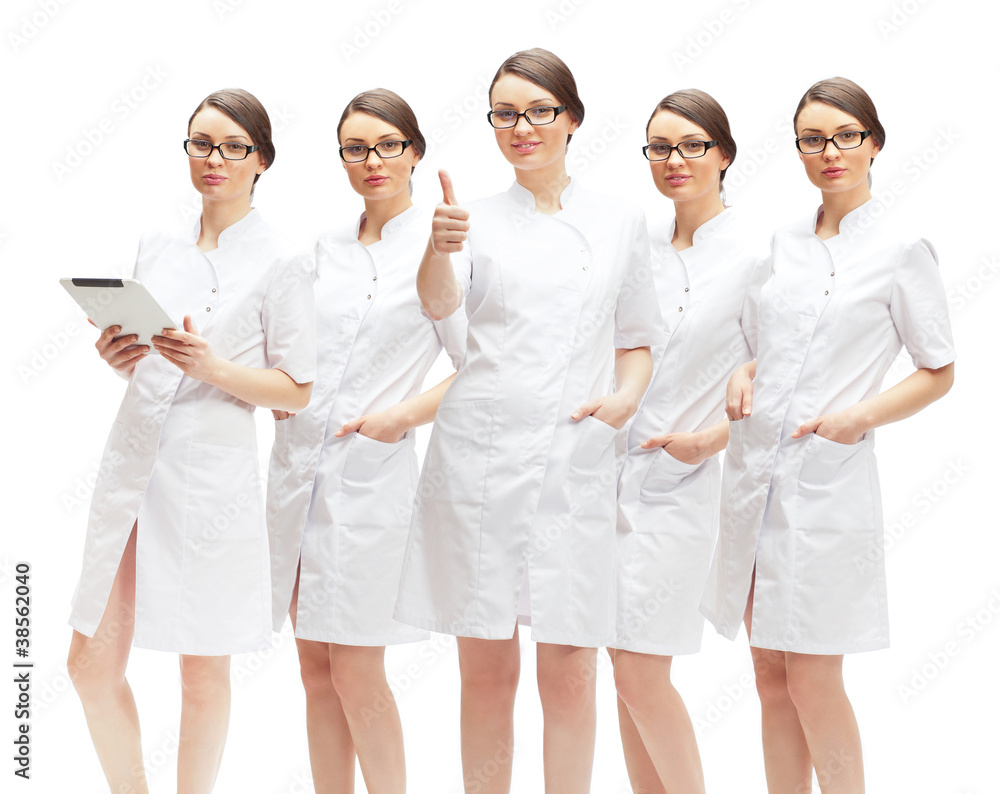 Portrait of young pretty doctor thumbs up with her clones in dif