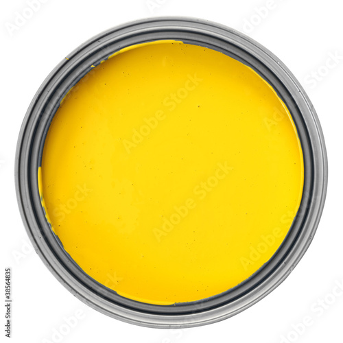 Can full of yellow paint isolated on white background, opened container photographed from above