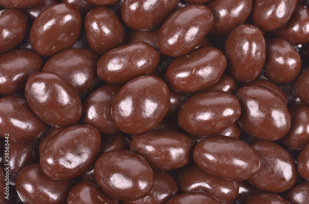 Dark brown dragee, chocolate covered nuts Dark brown dragee, chocolate covered nuts
